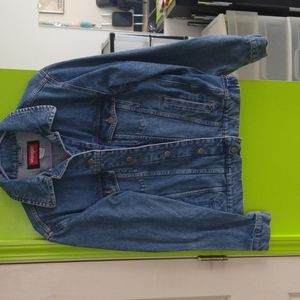 Pre owned men's small wrangler denim jacket.